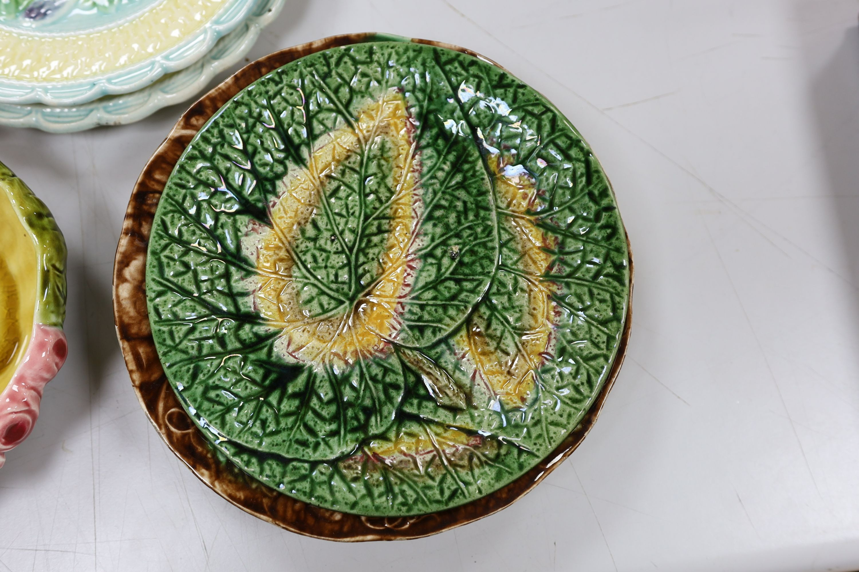 Two pairs of majolica dishes, three others, posy vase